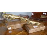 2 brass Jaguar car mascots mounted on timber