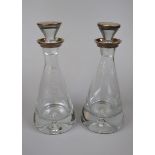 Pair of hallmarked silver topped decantersÿ