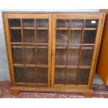 Glazed bookcase - Approx size: Width 107cm Depth 28cm Height 107cm