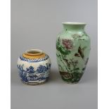 Oriental hand painted milk glass vase together with a ginger jar