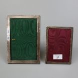 2 hallmarked silver photo frames W: 14cm H: 20.5cm  and  W: 11cm H: 16cm approx