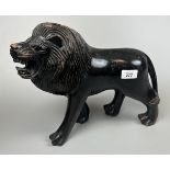 Large carved wooden lion - L: 36cm H: 27cm approx