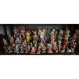 Collection of ornamental clowns, mostly Leonardo