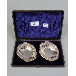 Cased pair of pierced hallmarked silver pin dishes - Approx weight: 46g