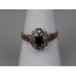 9ct gold sapphire and diamond cluster ring - Size: O