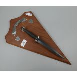 Fairbairn Sykes style commando dagger mounted on wall plaque
