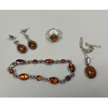 Collection of amber set jewellery to include silver