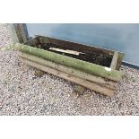 Large wooden trough planter