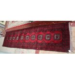 Red patterned runner - Approx size: 292cm x 77cm