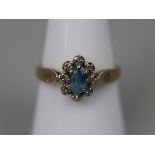 9ct gold blue topaz and diamond cluster ring - Size: P