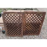 Pair of heavy metal grates