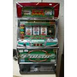 Pulsar gaming machine with tokens (lights up but not operational)