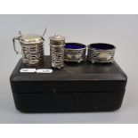 Hallmarked silver cruet set in box