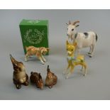 3 Beswick rabbit figurines together with 2 Beswick rabbit figurines and a baby deer