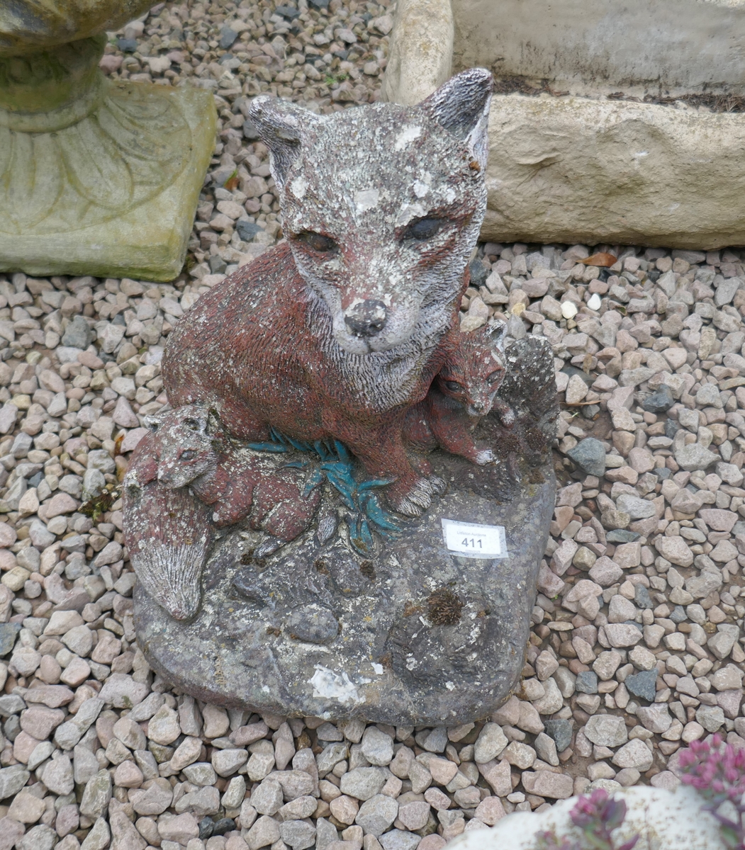 Stone fox and cubs figure