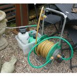 Hozelock hose cart with hose and spray nozzle together with 2 further nozzles and 5ltr ready to