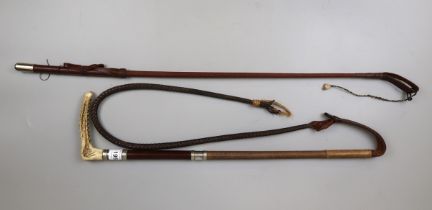 M H W Weatherby riding crop together with a riding whip