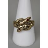 9ct gold ring in form of snake with stone set eyes - Size R