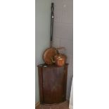 Copper kettle and warming pan together with oak corner cupboard