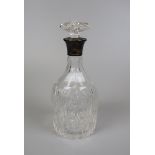 Silver topped cut glass decanter