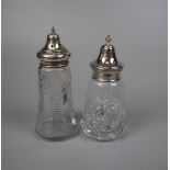 2 cut glass and silver topped sugar shakers