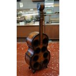 Wine rack in the form of a cello