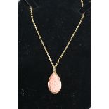 18ct gold coral set pendant on 18ct gold chain