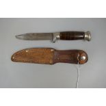 Knife in sheath marked Tent Brand, Sheffield