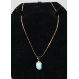 14ct gold necklace with turquoise set pendant