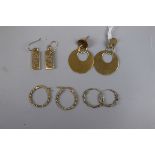 4 pairs of gold on silver earrings - one pair set with diamonds