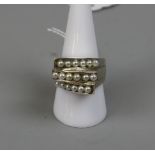 Silver pearl set ring