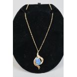 Fine 9ct opal & diamond set pendent on 9ct gold chain - Approx weight 16.5g