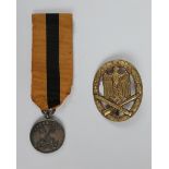 German Assault badge together with a Securicor long service medal