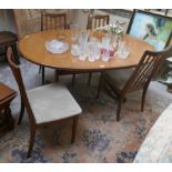 Mid century G-Plan extending dining table together with set of 4 Leslie Dandy G-Plan chairs