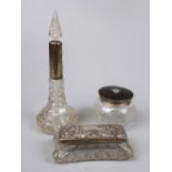 Silver mounted cut glass perfume bottle together with 2 hallmarked silver lidded glass pots