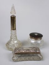 Silver mounted cut glass perfume bottle together with 2 hallmarked silver lidded glass pots