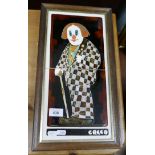 Framed Majolica clown tiles marked Greco