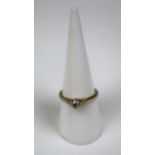 9ct gold diamond solitaire ring - Size O