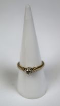 9ct gold diamond solitaire ring - Size O