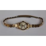 Ladies Omega 17 jewel watch with a 9ct gold case & a rolled gold strap