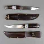 2 WW2 sheath knives - one German one marked Sheffield