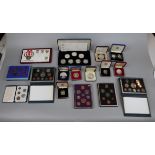 Collection of commemorative coins in original boxes
