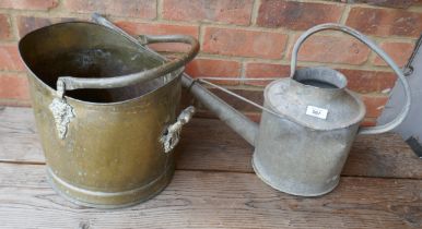 Galvanised watering can together with brass coal scuttle