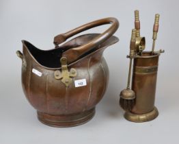 Large brass and copper coal scuttle together with fire irons