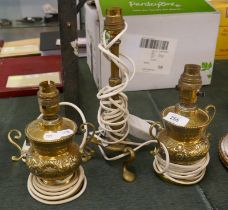 Pair of brass antique lamps and another
