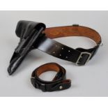 Post WW2 black leather Sam Browne belt with revolver holster