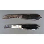 2 folding knives - one Chinese