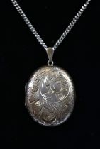 Large silver locket on chain