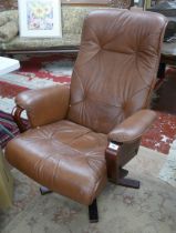 Brown leather swivel easy chair