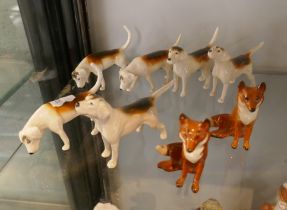 Collection of 6 Beswick hounds with 2 foxes